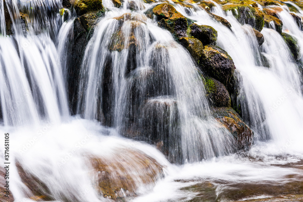Fototapeta premium Close-up of the waterfall, natural background