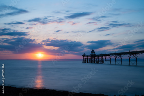 Pier over ocean at sunset in Clevedon  Somerset  England