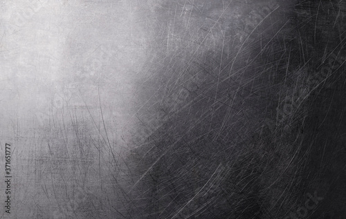 Old metal background, brushed metal texture with scratches