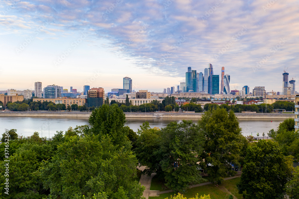 panoramic views of the city, the ancient fortress and the river at dawn filmed from a drone