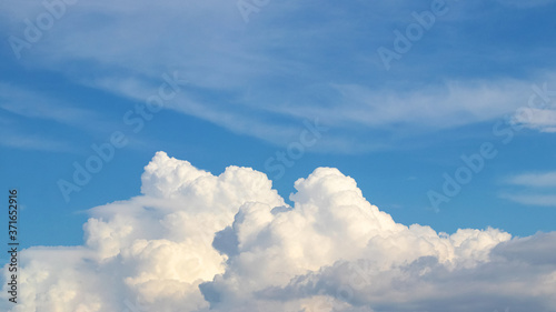Photography Big white curly cloud in the blue sky