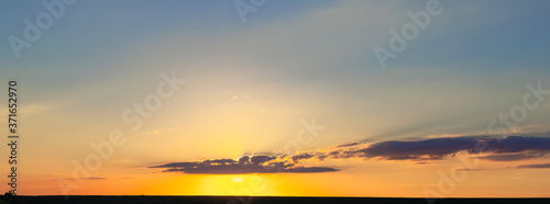 Panorama of the picturesque evening sky during sunset