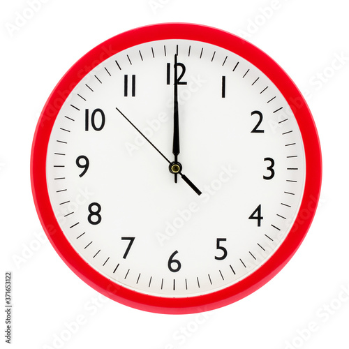 Clock on a white isolated background shows 12 o'clock on New Year's Eve