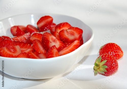 strawberries in glass bowl