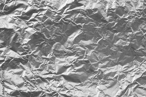 metal crumpled piece of paper background for art design.