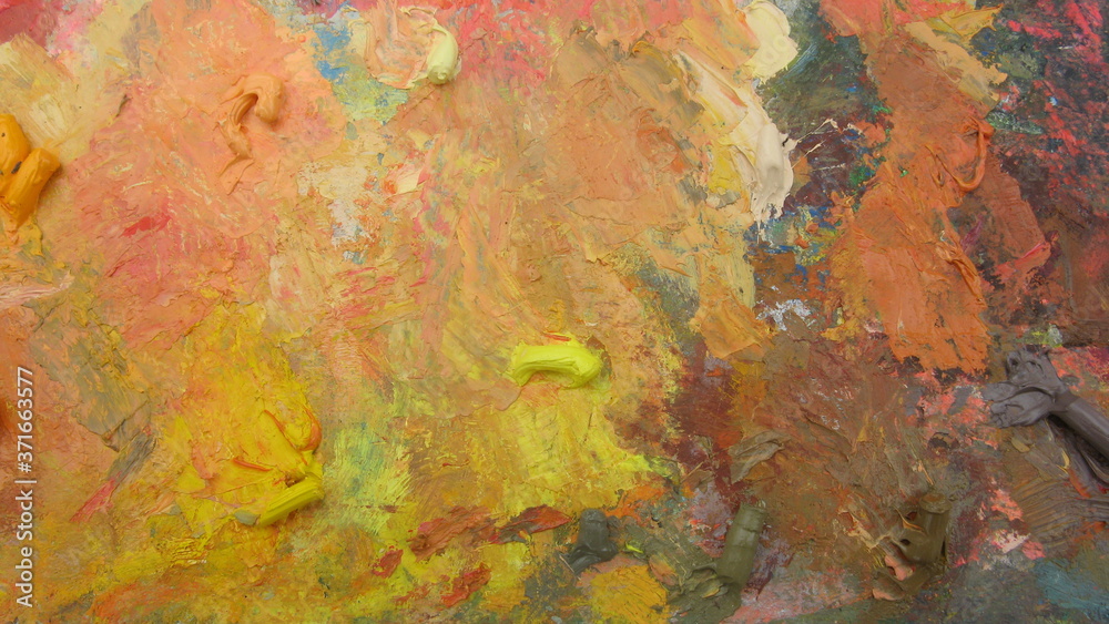 multi-colored palette of the artist with paints