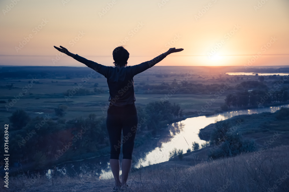 Meditation in sunrise summer field. Relax health concept Meditation in sunrise summer field. Relax health concept