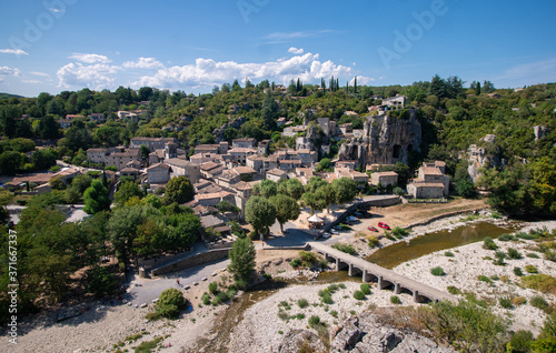 The small medieval village Labeaume framed by rocks and the river Ardeche in southern France
