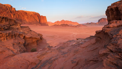 Papier peint photo Corail Wadi Rum desert landscape in Jordan with mountains and dunes at sunrise  © Lana Kray
