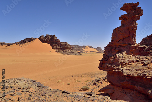 SAND DUNES AND ROCK FORMATIONS IN THE TADRART PARK IN ALGERIA