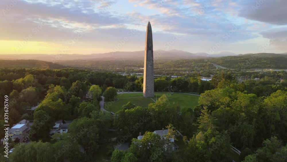 Aerial 4K video of Bennington Monument obelisk at sunset. Filmed in Bennington, Vermont.