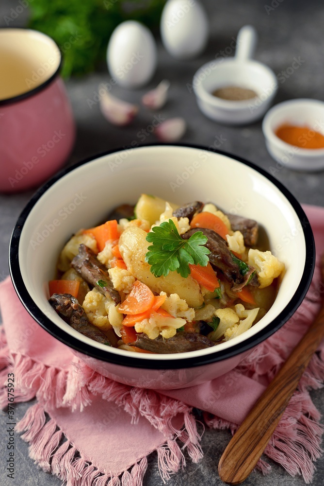 Turkey stew heart with potatoes, cauliflower, onions and carrots. Turkey stew heart with potatoes, cauliflower, onions and carrots.
