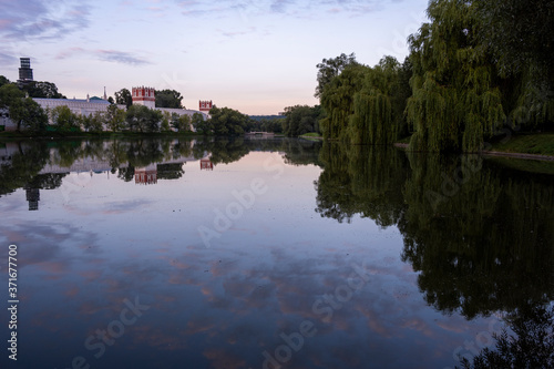 panoramic views of the city, the ancient fortress and the river at dawn filmed from a drone