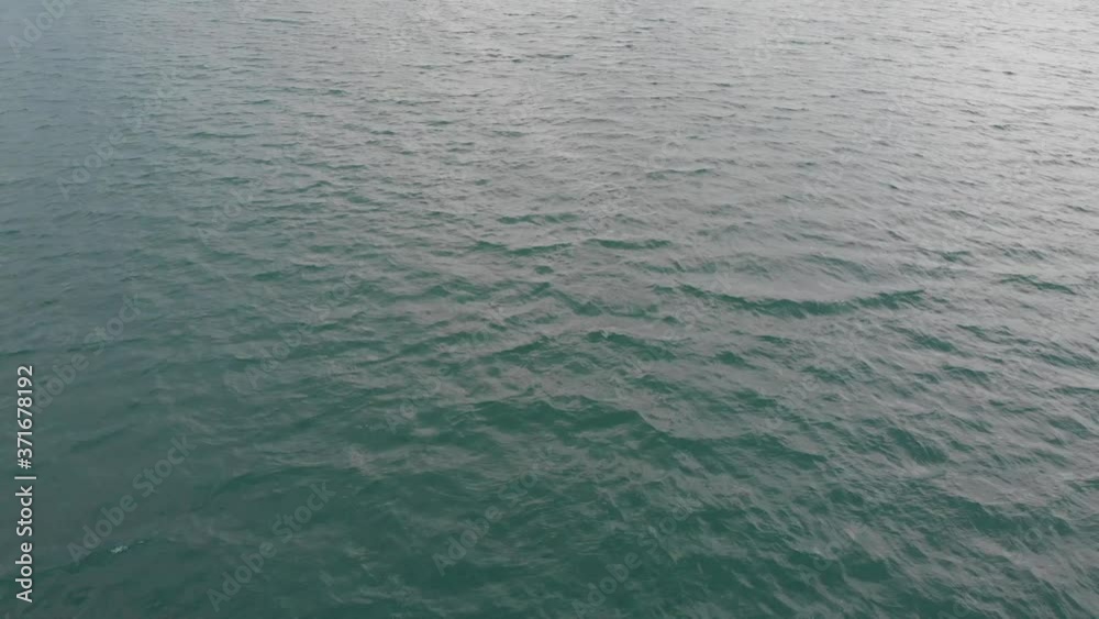 Drone shooting at high speed forward shooting the Sea or sea waves. Travel concept, forward flight. Drone shooting at high speed forward shooting the Sea or sea waves. Travel concept, forward flight.