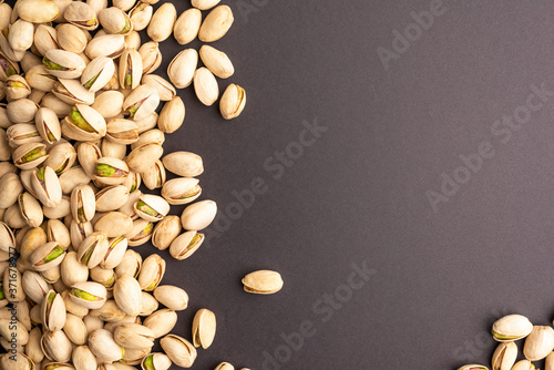 Isolated pistachio on back background.