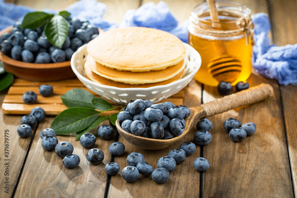Blueberries with pancakes. Dessert breakfast. Blueberries with pancakes. Dessert breakfast.