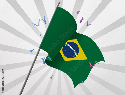 The celebratory flag of Brazil flies at height