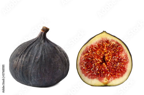 A halved and ripe fig isolated on a white background