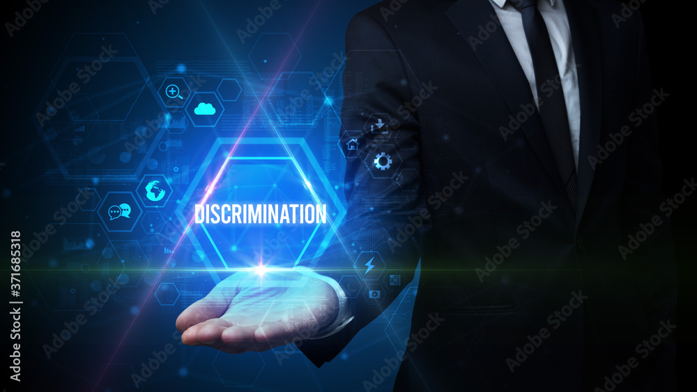 Man hand holding DISCRIMINATION inscription, social media concept Man hand holding DISCRIMINATION inscription, social media concept