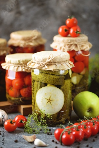 Homemade pickled cucumbers with apple slices.
