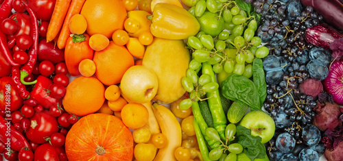 Rainbow fruit and vegetable background photo