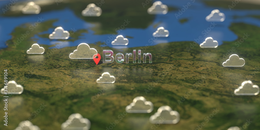 Cloudy weather icons near Berlin city on the map, weather forecast related 3D rendering Cloudy weather icons near Berlin city on the map, weather forecast related 3D rendering