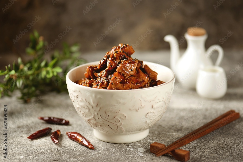 Fototapeta premium Spicy pork with sweet and sour soy sauce.