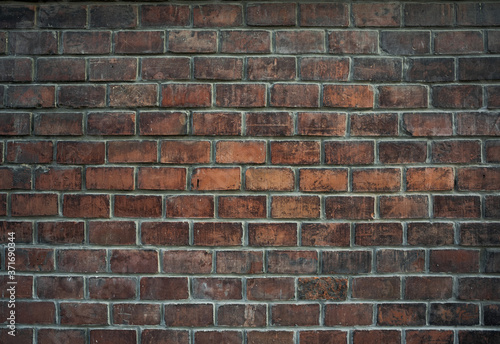 Wall of Old Red Burnt Bricks  Solid Durable Material as a Decorative Rustic Background