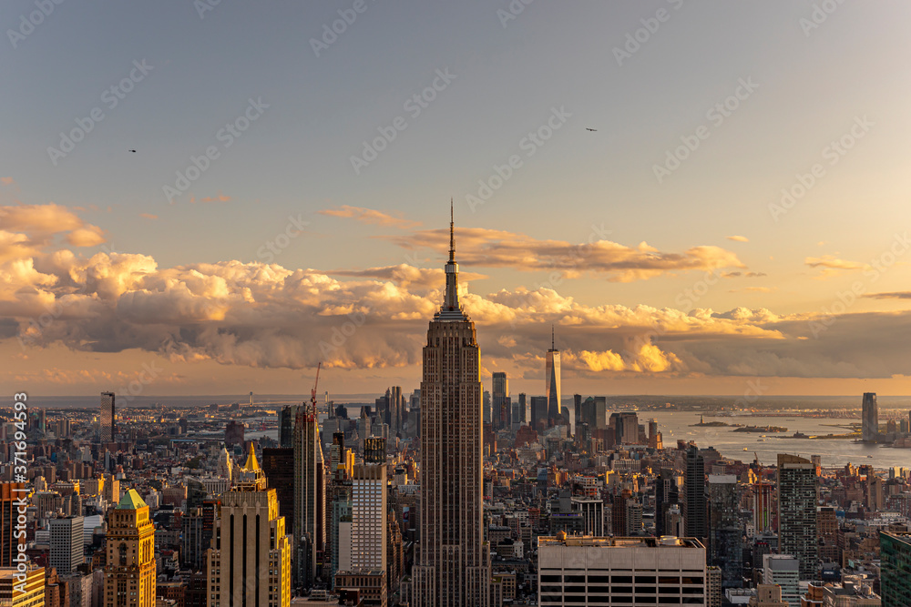 Manhattan Midtown Skyline with Empire State Building and One World Trade Center at Sunset. NYC, USA	