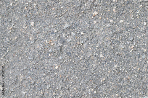 The seamless texture of the asphalt close-up