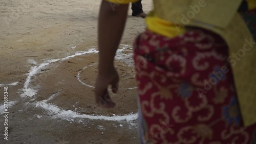 TERENGGANU, MALAYSIA, JULY 21 2019: Asian culture, Top Spinning, or Gasing is a well-known traditional game played by Malays in Terengganu and Kelantan. photo