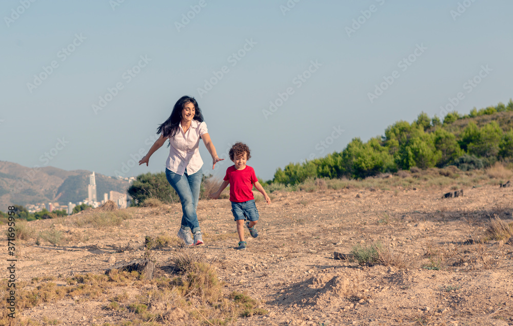 Mother and son in the field enjoying