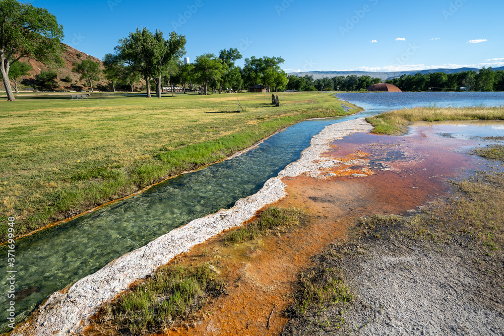 Hot springs mineral water flows through Hot Springs State Park in Thermopolis, Wyoming Hot springs mineral water flows through Hot Springs State Park in Thermopolis, Wyoming