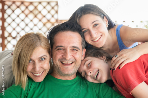 Happy Family Faces having Fun and Taking Selfie Together