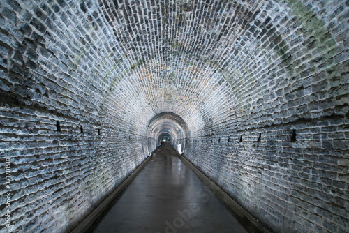 An underground tunnel lit up