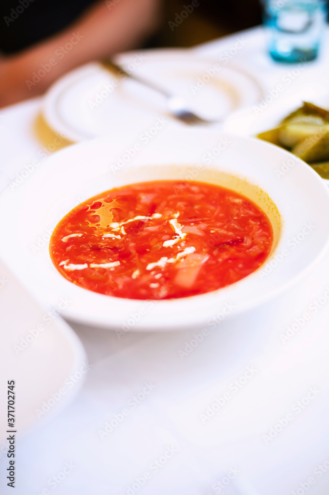 tomato soup in a white bowl tomato soup in a white bowl