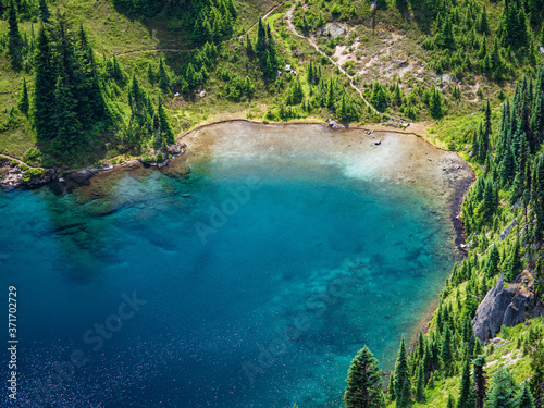 Clear blue alpine lake in Mount Rainier National Park © Graham