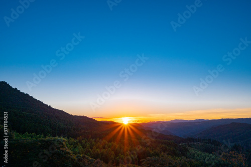 夕日　朝日　