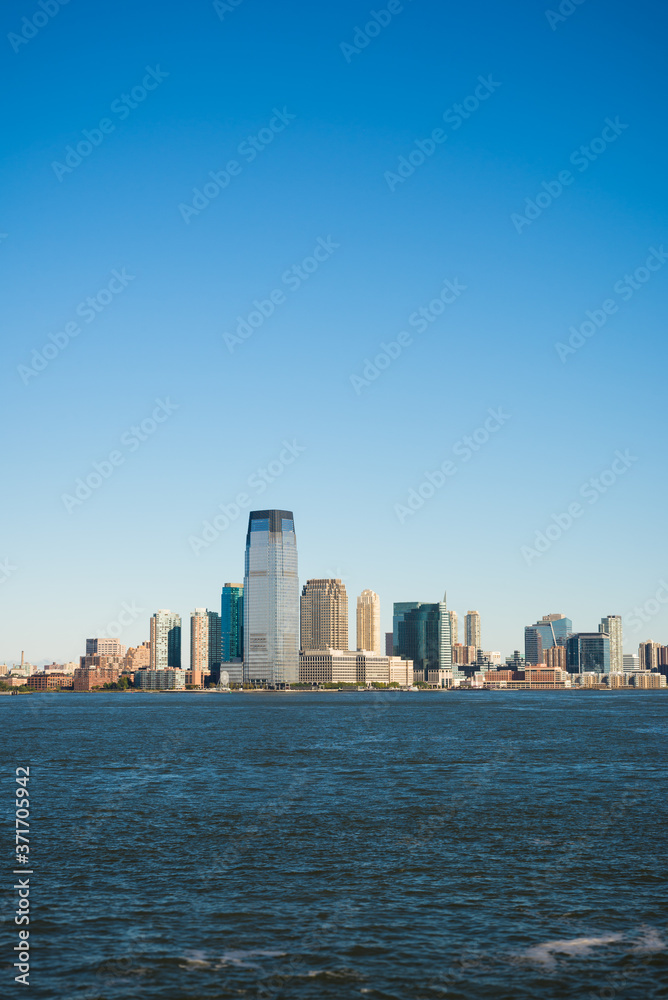Skyline of New Jersey with blue sky seen from Manhattan, New York