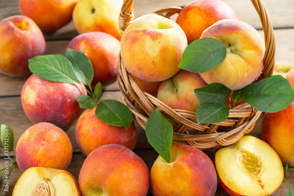 Ripe peaches on an old background Ripe peaches on an old background