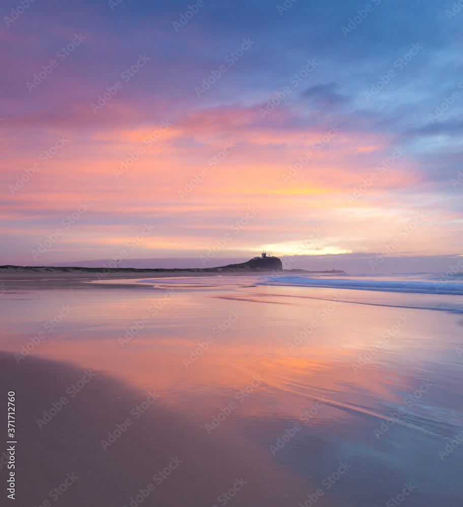 Sunrise at Nobbys Beach - Newcastle Australia. Newcastle is Australia's second oldest city and home to some amazing beaches.