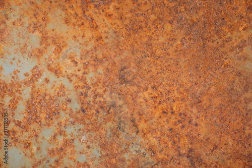 Rust on the surface of the iron plate Vintage style background © Chaisi