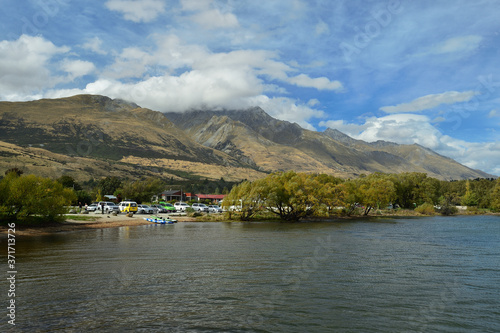 Garden Queenstown With house and car park and mountain background © panthawat
