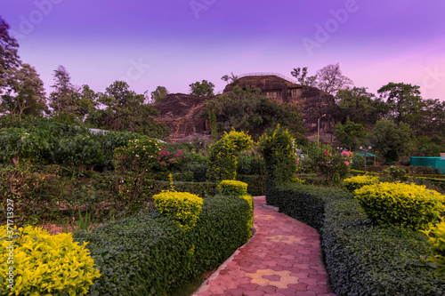 Shri Panch Pandav Caves. Pachmarhi 5 hilltop caves carved more than 1000 years ago, with a formal garden view  photo