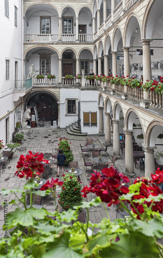 Italian courtyard in Lviv, Ukraine decorated with flowers