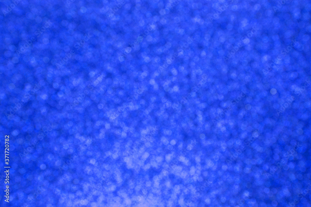 Obraz premium Abstract dark blue bokeh background for christmas, Celebration concept.