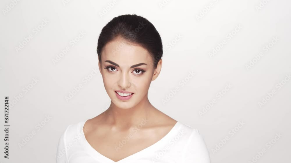 Studio portrait of young and beautiful brunette woman Studio portrait of young and beautiful brunette woman