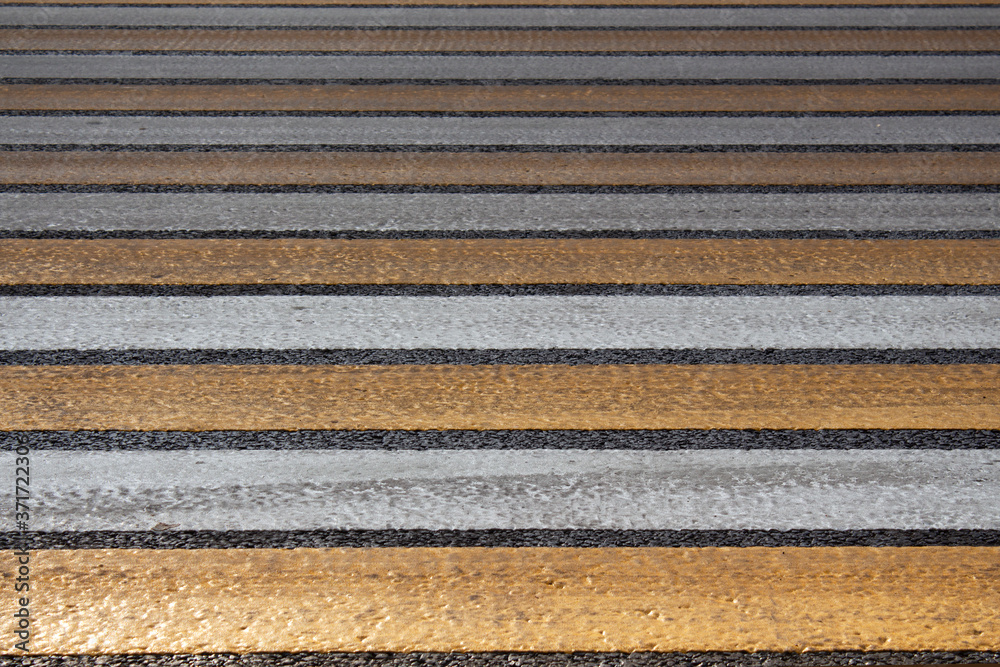Yellow-white crosswalk. Road markings Yellow-white crosswalk. Road markings