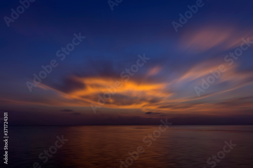 Motion color cloud on the twilight sky at the lake. © noppharat