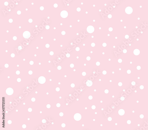 White polka dot on pink background. Pink background texture. 